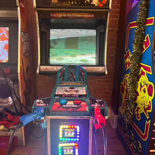 Arcade game cabinet 16 on the floor at 1UP Arcade Bar